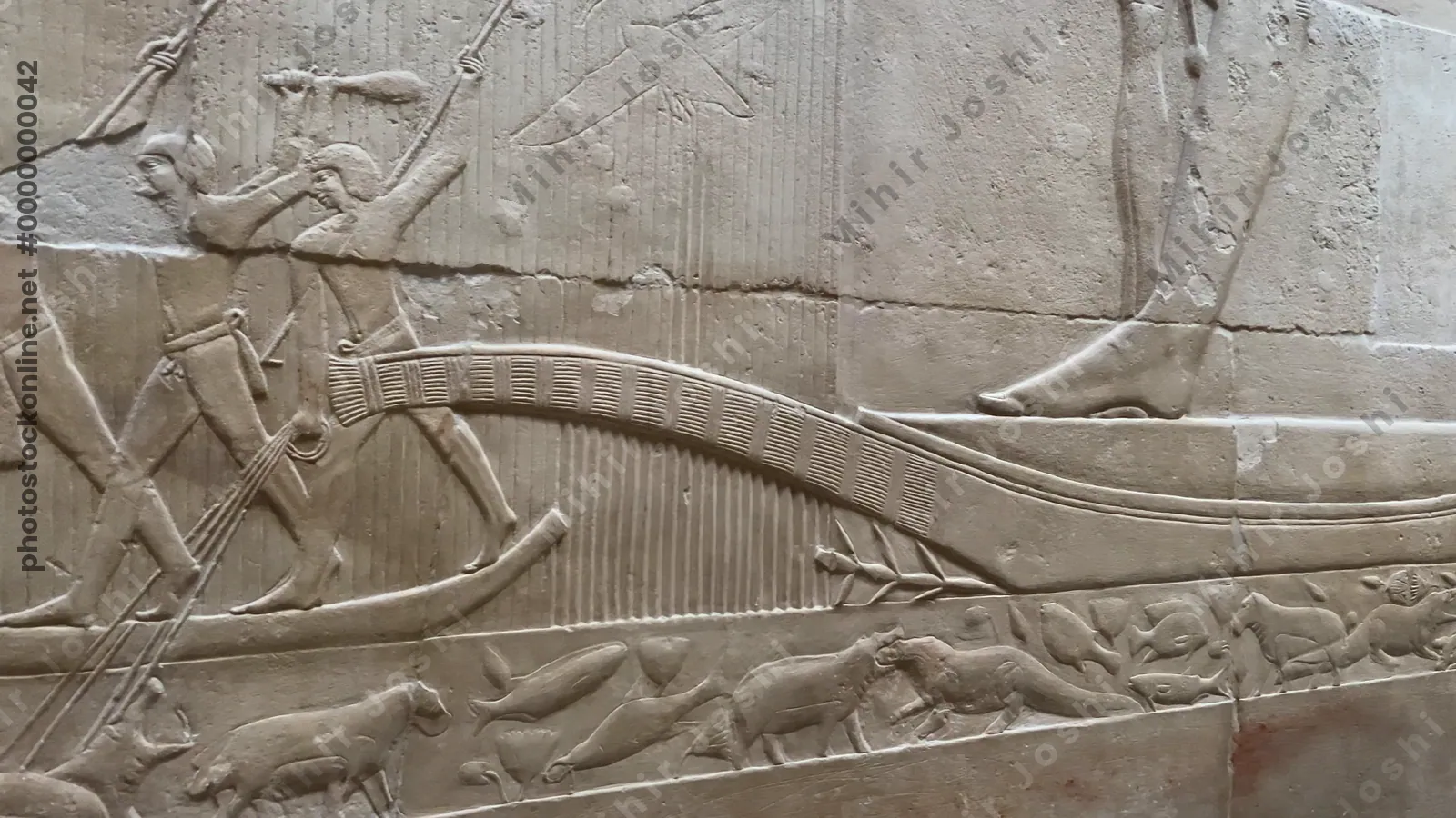Saqqara, Egypt - Feb 5, 2024: Relief from Kagemni's mastaba in Saqqara showing men hunting hippos