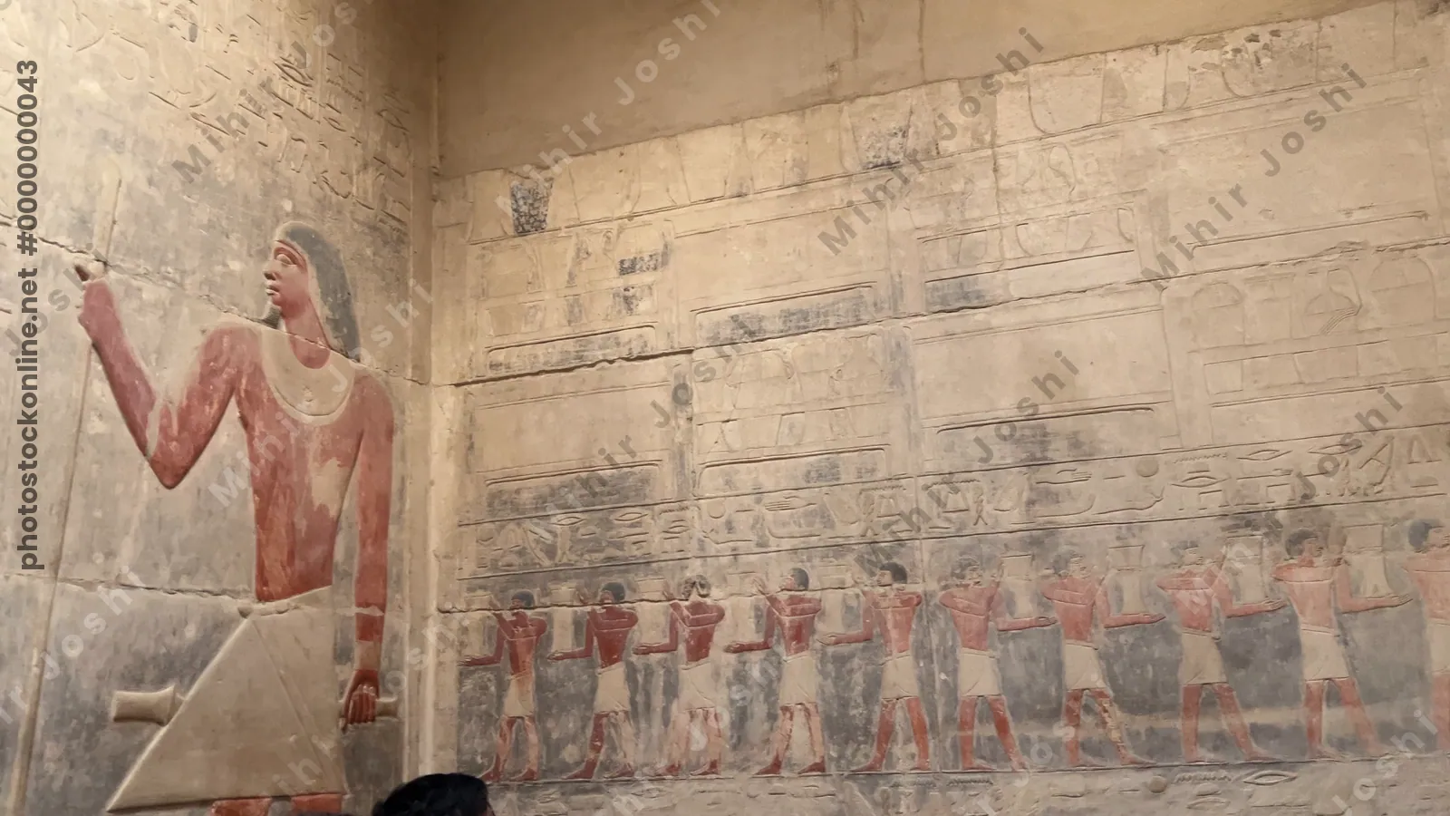 Saqqara, Egypt - Feb 5, 2024: intricate relief art from Kagemni's mastaba in the Saqqara Necropolis, showcasing ancient Egyptian craftsmanship and culture.