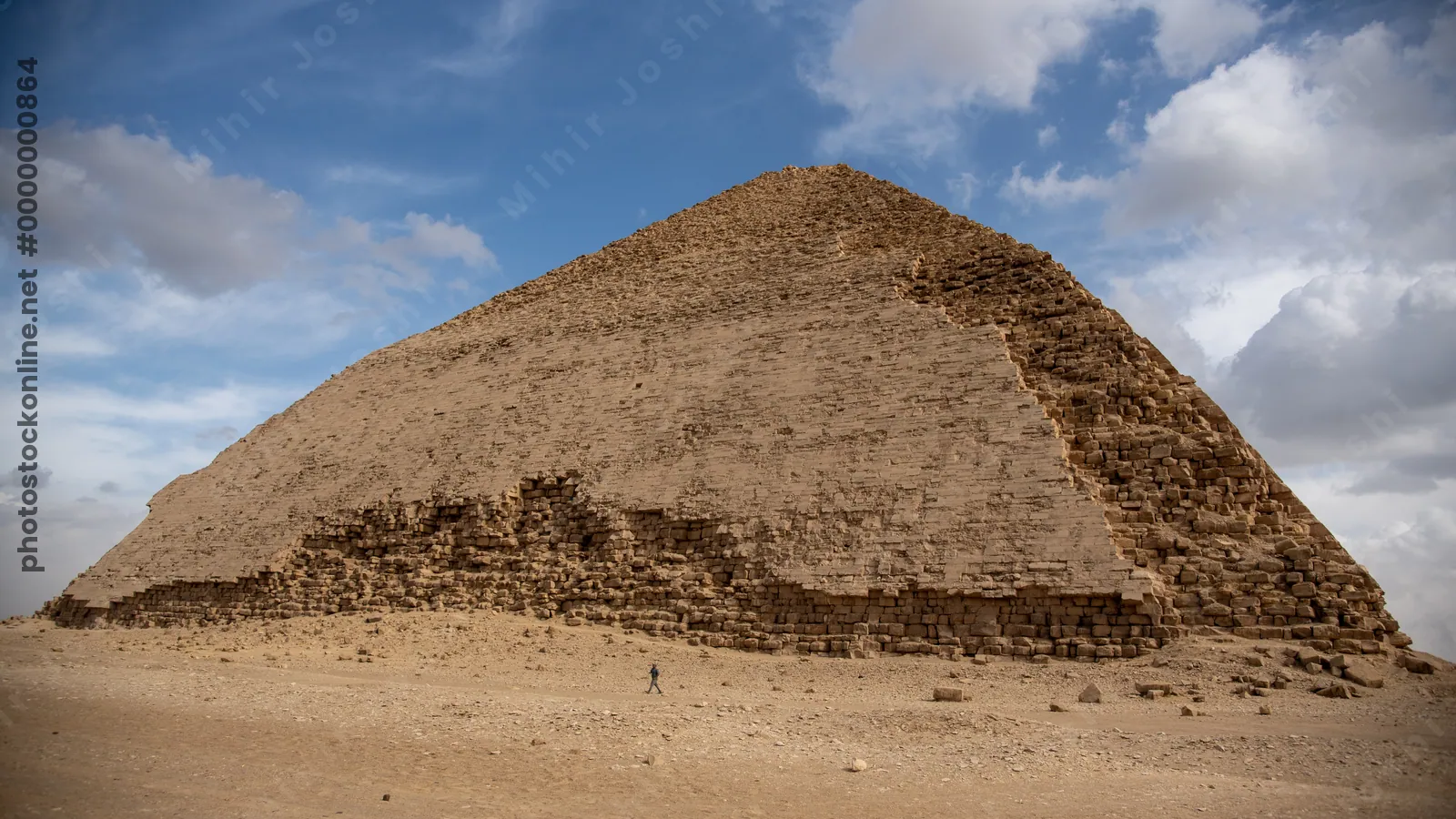 Dahshur, Egypt - Feb 5, 2024: The Bent Pyramid at Dahshur, built by Pharaoh Sneferu during the Old Kingdom, shows a unique change in angle midway up its structure.