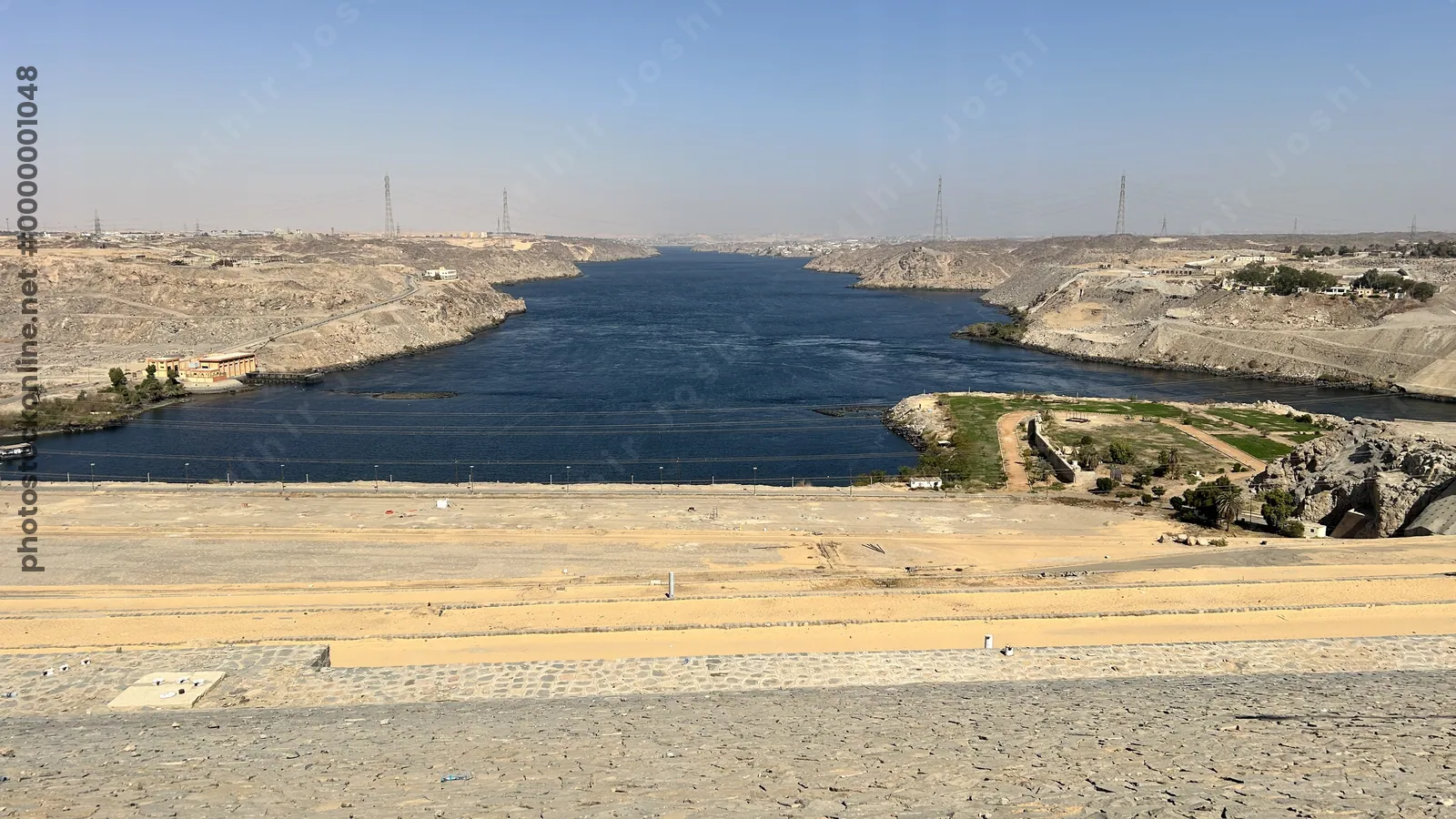 Aswan, Egypt - Feb 7, 2025: view of the Aswan Dam, a major engineering landmark on the Nile River in Aswan, Egypt.