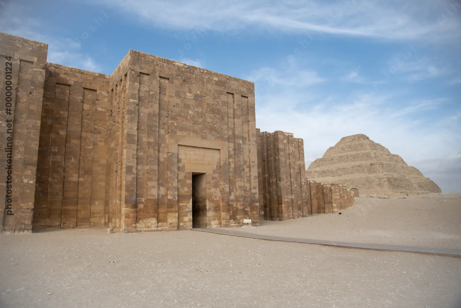 Saqqara, Egypt - Feb 5, 2024: Southeast corner entrance gate of the Step Pyramid complex at Saqqara, Egypt, built during the 3rd Dynasty, Old Kingdom.
