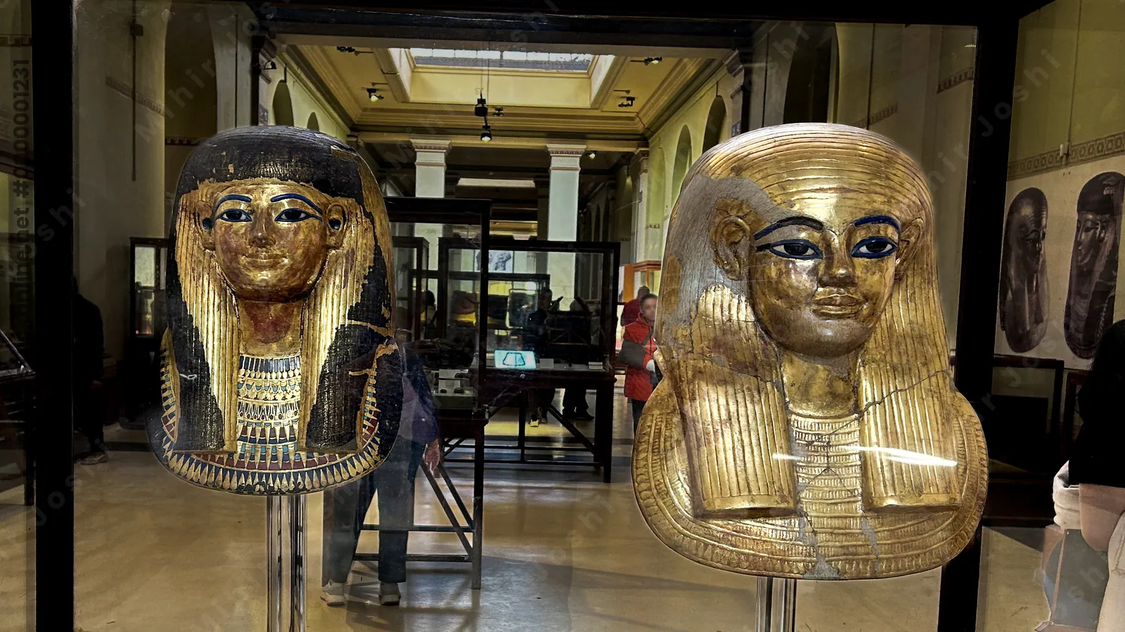 Cairo, Egypt - Feb 4, 2025: Gilded funerary masks of Yuya and Thuya, parents of Queen Tiye, on display at the Egyptian Museum in Cairo, Egypt.