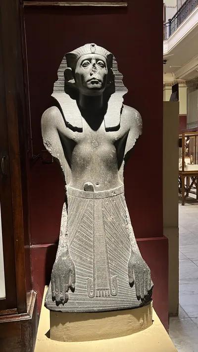 Cairo, Egypt - Feb 4, 2025: Statue of Pharaoh Senusret III, Middle Kingdom ruler of Egypt, on display at the Egyptian Museum in Cairo.