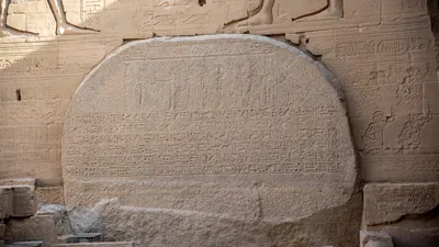 Aswan, Egypt - Feb 7, 2025: Stela of Ptolemy VI and Cleopatra II recording tax grant to the Temple of Isis, Philae, Egypt.