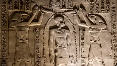 Relief of Thoth and Horus purifying Pharaoh Ptole