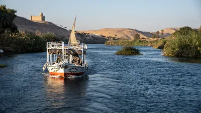 Tour boats cruising the Nile River at Aswan, Egyp