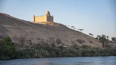 The Mausoleum of Aga Khan sits atop a desert hill