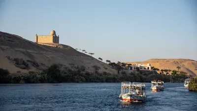 Tour boats cruising the Nile River at Aswan, Egyp