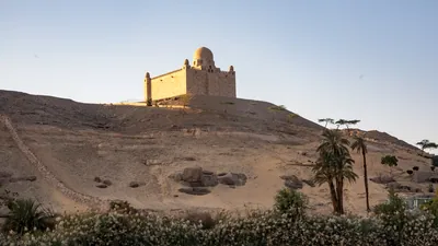 The Mausoleum of Aga Khan sits atop a desert hill