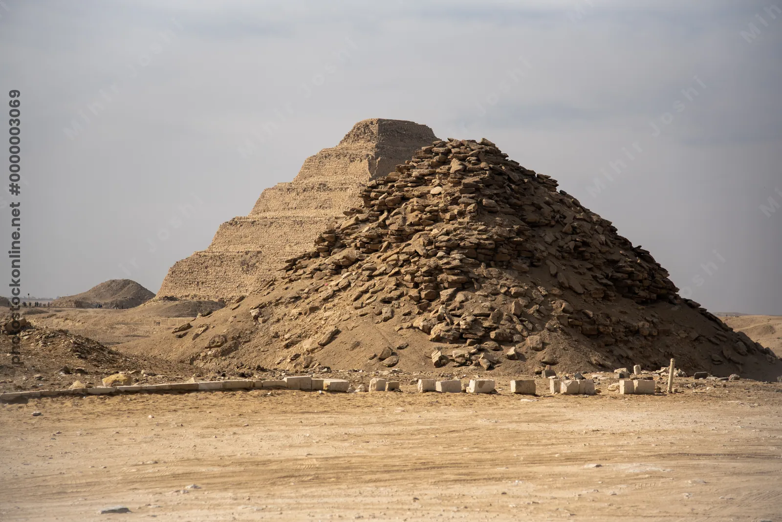 Pyramid of Userkaf with the Step Pyramid of Djose