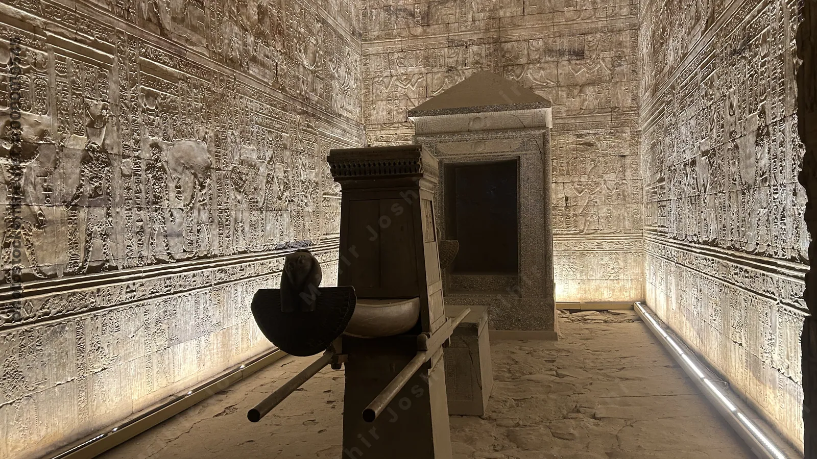 Edfu, Egypt - Feb 9, 2025: Ceremonial barque of Horus displayed inside the Temple of Edfu in Egypt, an ancient sacred boat used in religious rituals.