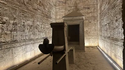 Edfu, Egypt - Feb 9, 2025: Ceremonial barque of Horus displayed inside the Temple of Edfu in Egypt, an ancient sacred boat used in religious rituals.