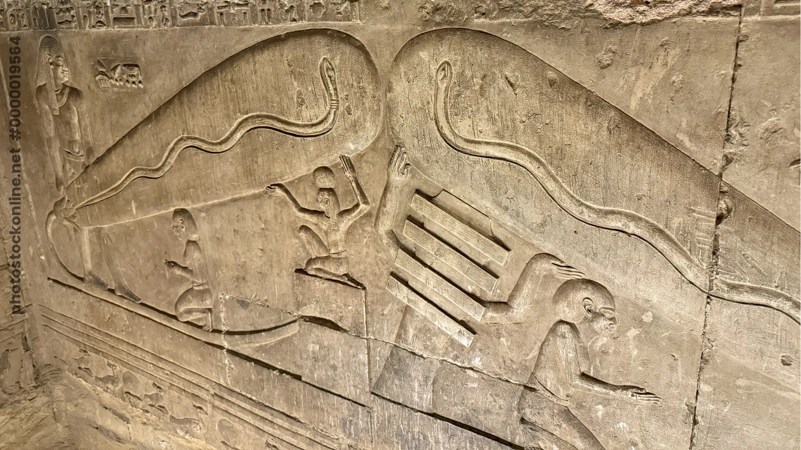 Dendera, Egypt - Feb 10, 2025: Ancient relief at Dendera Temple, known as the Dendera light, showing Harsomtus within the womb of the sky goddess Nut.