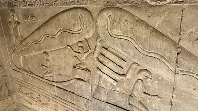 Dendera, Egypt - Feb 10, 2025: Ancient relief at Dendera Temple, known as the Dendera light, showing Harsomtus within the womb of the sky goddess Nut.