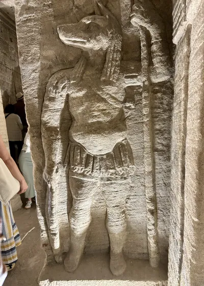 Alexandria, Egypt - Feb 13, 2025: Stone relief depicting the funerary deity Anubis at the Catacombs of Kom El Shoqafa, a Greco-Roman necropolis and bu