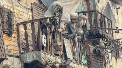 Balcony with marionette puppets at Khan el-Khalili bazaar in Cairo, Egypt