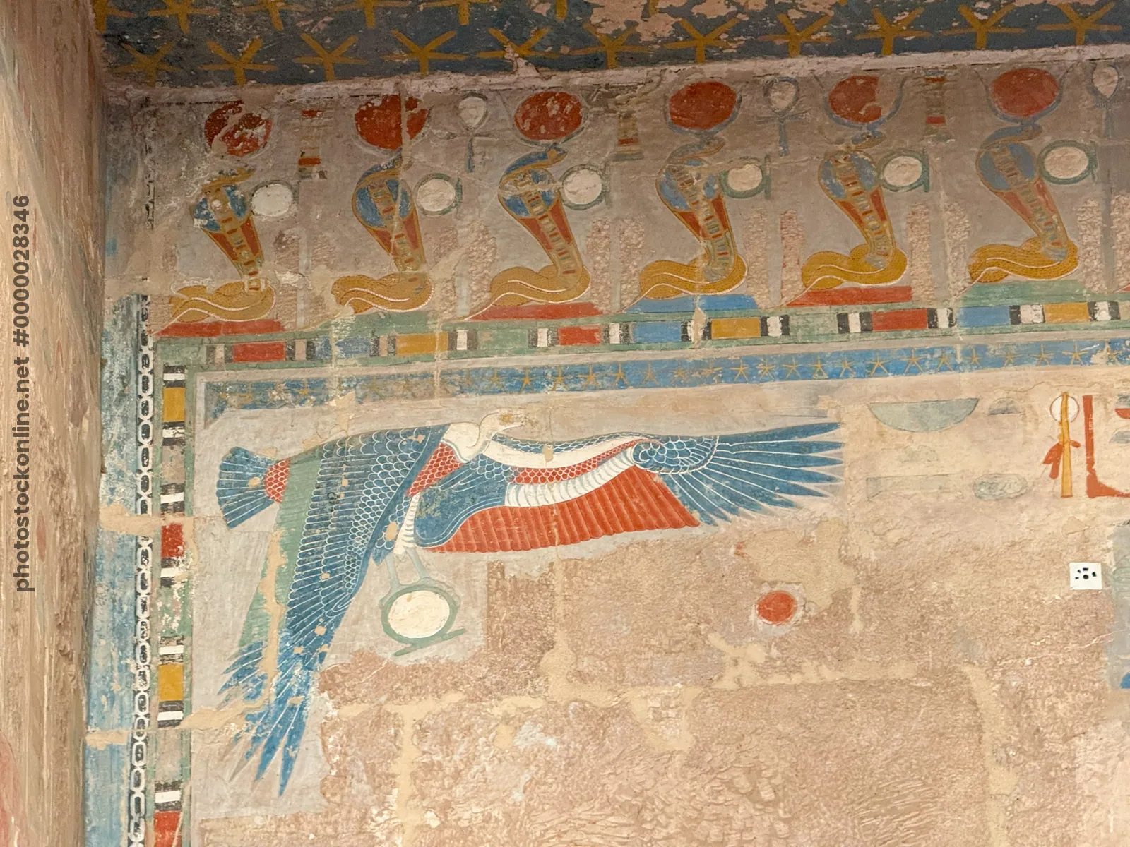 Frieze of uraei with sun disks at Mortuary Temple of Hatshepsut in Luxor, Egypt