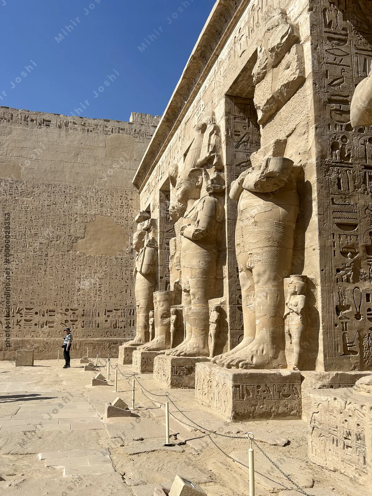 Ramessid statues and columns in Medinet Habu Temple, Luxor