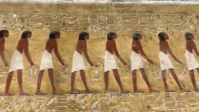 Valley of the Kings, Egypt - Feb 11, 2025: Painted crypt relief showing priests in funerary ceremonies in the Tomb of Seti I (KV17).