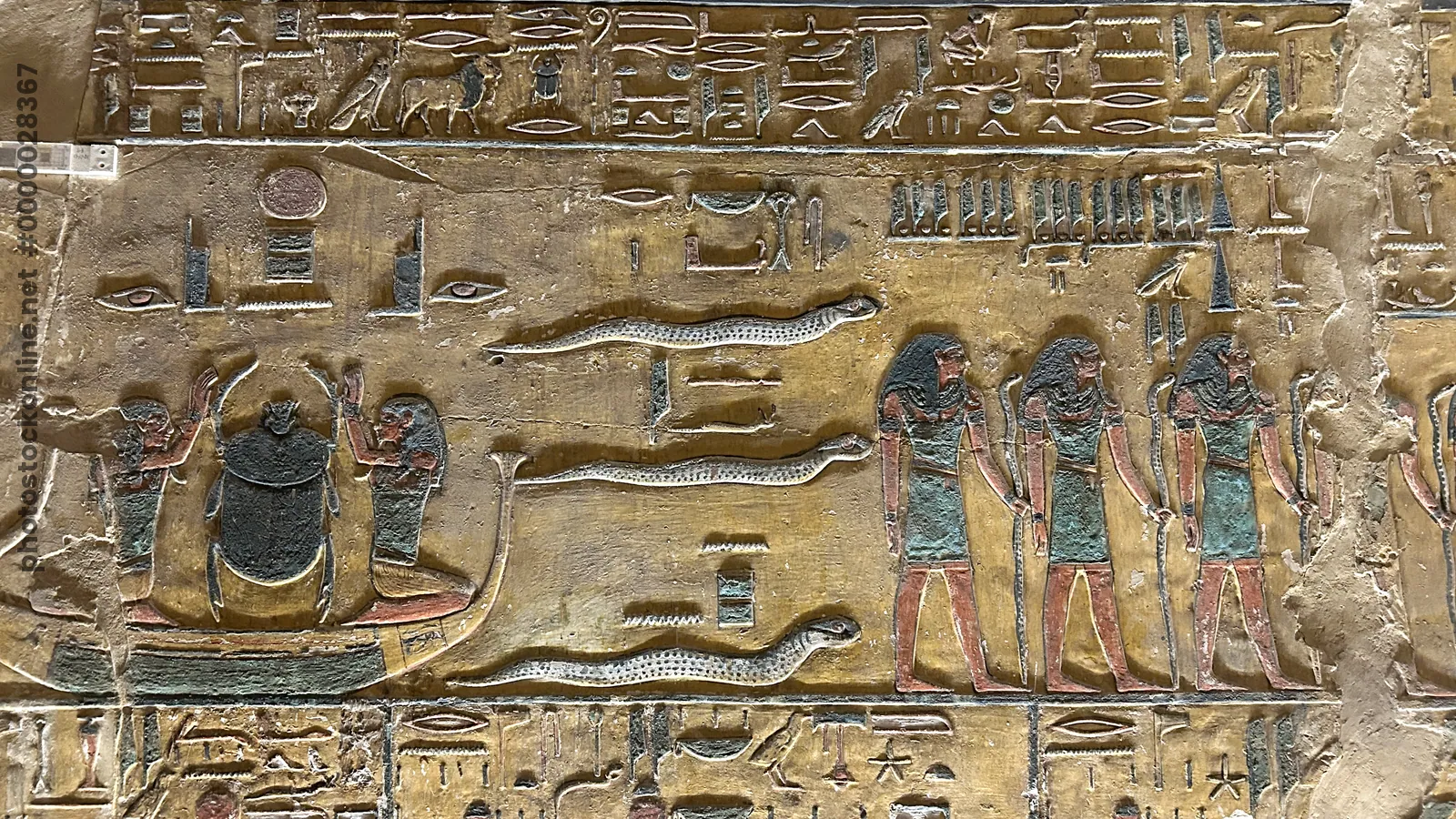 Valley of the Kings, Egypt - Feb 11, 2025: Painted relief from the first hour of the Amduat with barque of Khepri in the Tomb of Seti I (KV17).