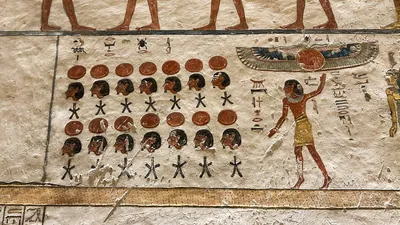 Valley of the Kings, Egypt - Feb 11, 2025: Painted relief from the fourth hour of the Amduat with figures and symbols in Tomb KV9.