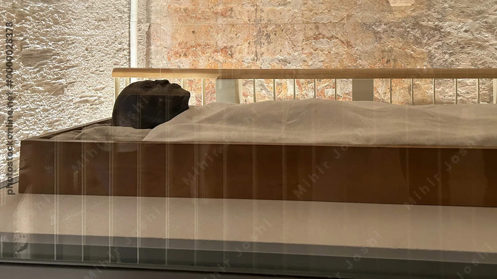 Luxor, Egypt - Feb 11, 2025: Mummy of Pharaoh Tutankhamun in his original tomb (KV62), Valley of the Kings, Luxor, Egypt.