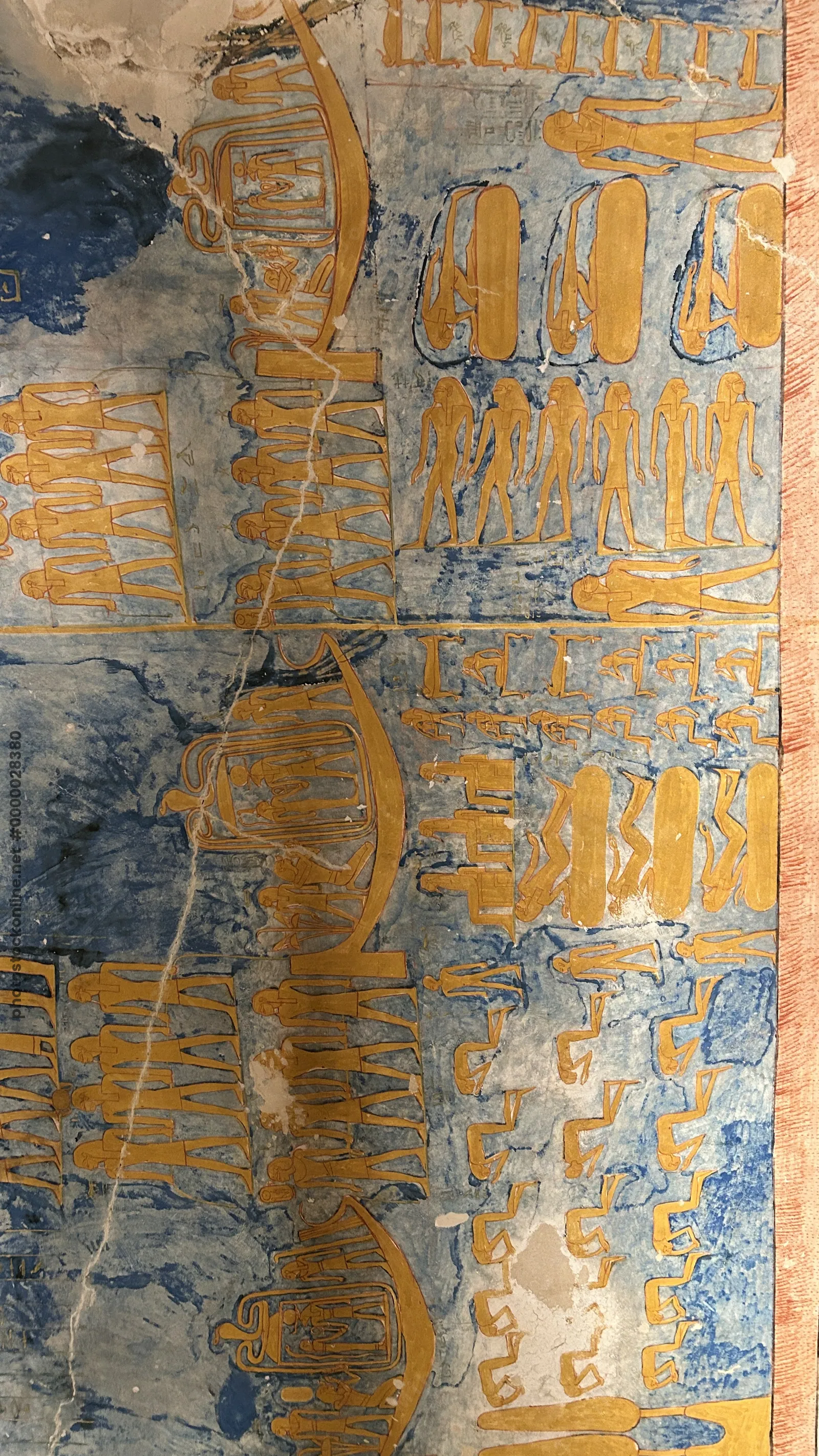 Luxor, Egypt - Feb 11, 2025: Painted relief from the Tomb of Ramesses IV in the Valley of the Kings, showing scenes from the Book of Gates with solar