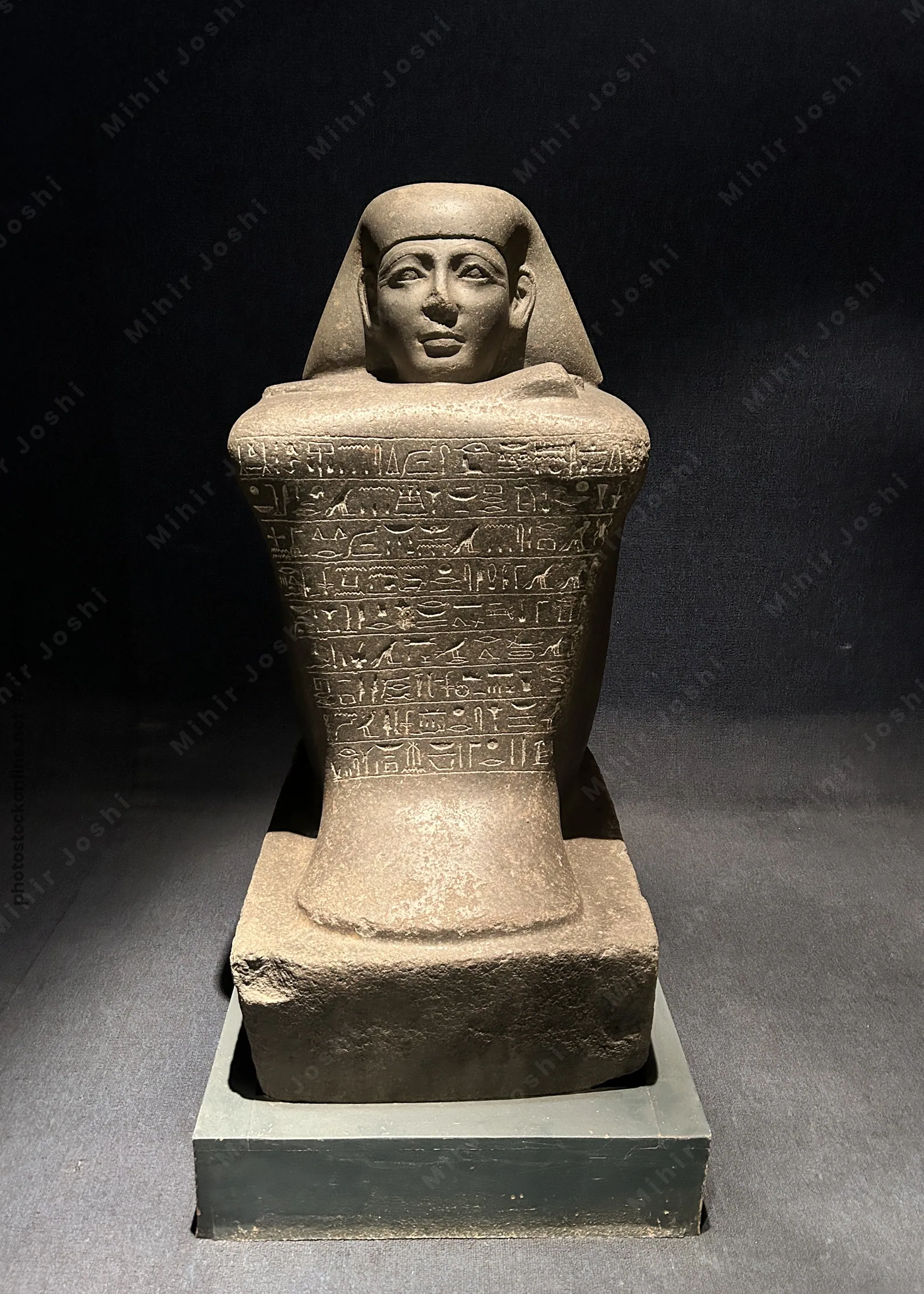 Luxor, Egypt - Feb 9, 2025: Black granite cube statue of Yamunedjeh, dating from the reign of Pharaoh Thutmose III, New Kingdom, 18th Dynasty, display