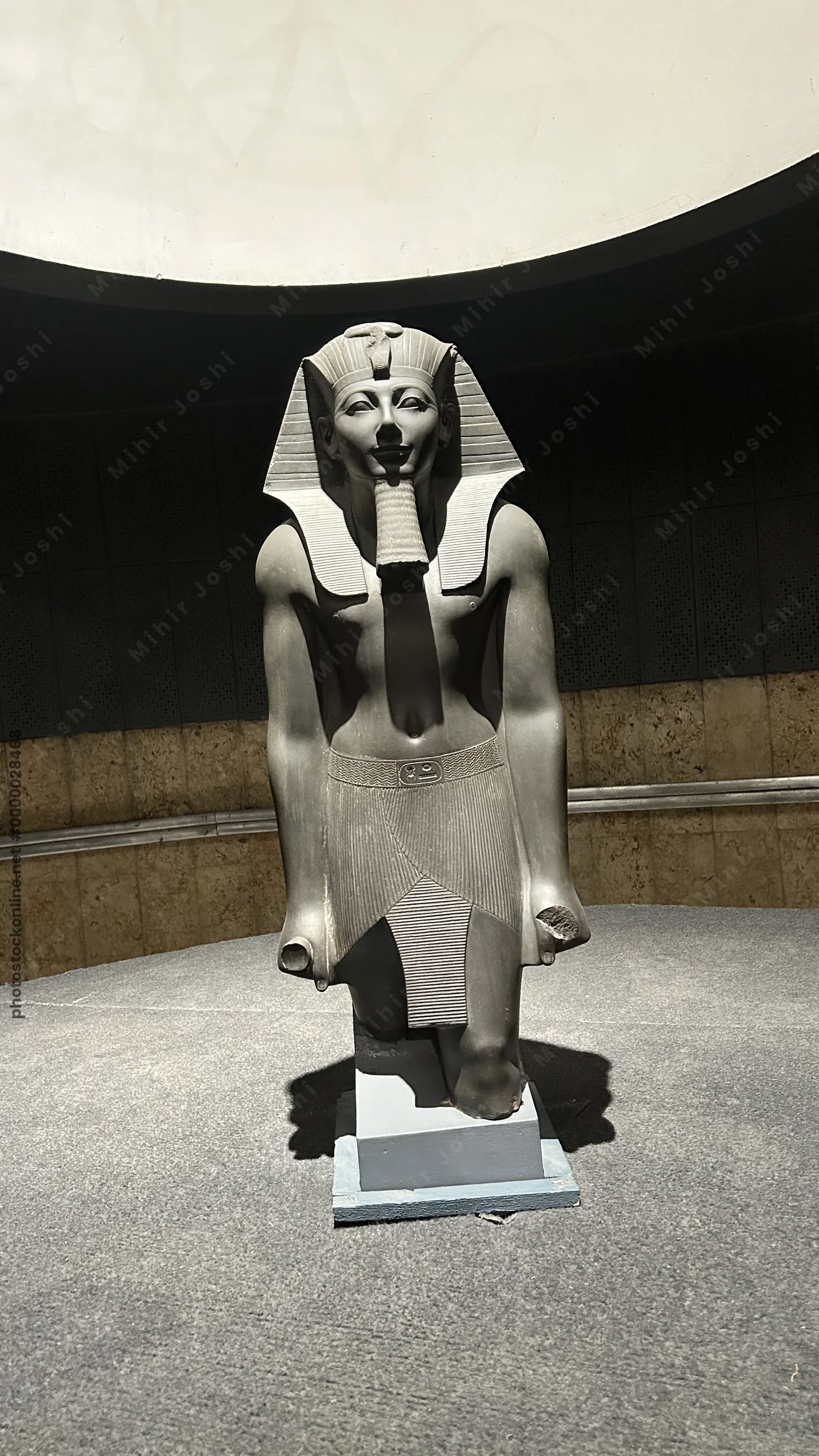 Luxor, Egypt - Feb 9, 2025: Ancient statue of Pharaoh Thutmose III from Egypt, displayed in the Luxor Museum as part of its archaeological collection.