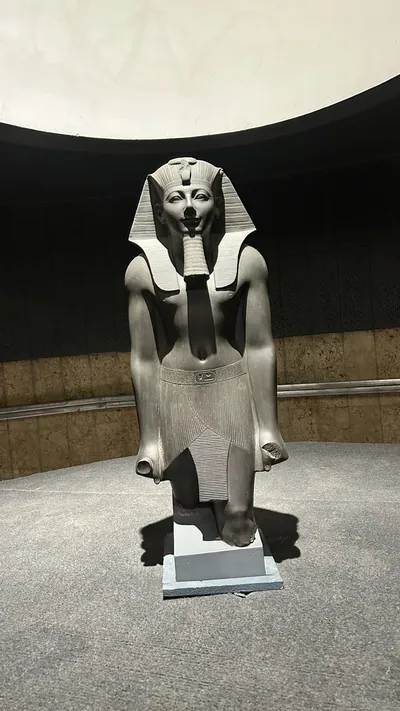 Luxor, Egypt - Feb 9, 2025: Ancient statue of Pharaoh Thutmose III from Egypt, displayed in the Luxor Museum as part of its archaeological collection.