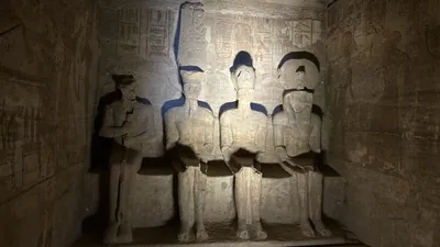 Aswan, Egypt - Feb 8, 2025: Sanctuary of the Great Temple of Abu Simbel with seated statues of Ptah, Amun-Ra, Ramesses II, and Ra-Horakhty carved into