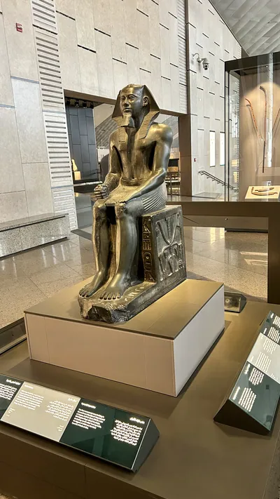 Statue of Pharaoh Khafre, builder of the second Giza pyramid, on display at the Grand Egyptian Museum in Cairo, Egypt.
