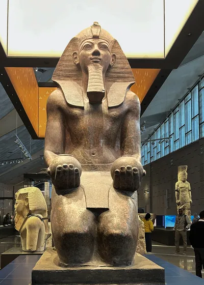 Kneeling statue of Queen Hatshepsut, one of ancient Egypt's few female pharaohs, on display at the Grand Egyptian Museum in Giza, Egypt.