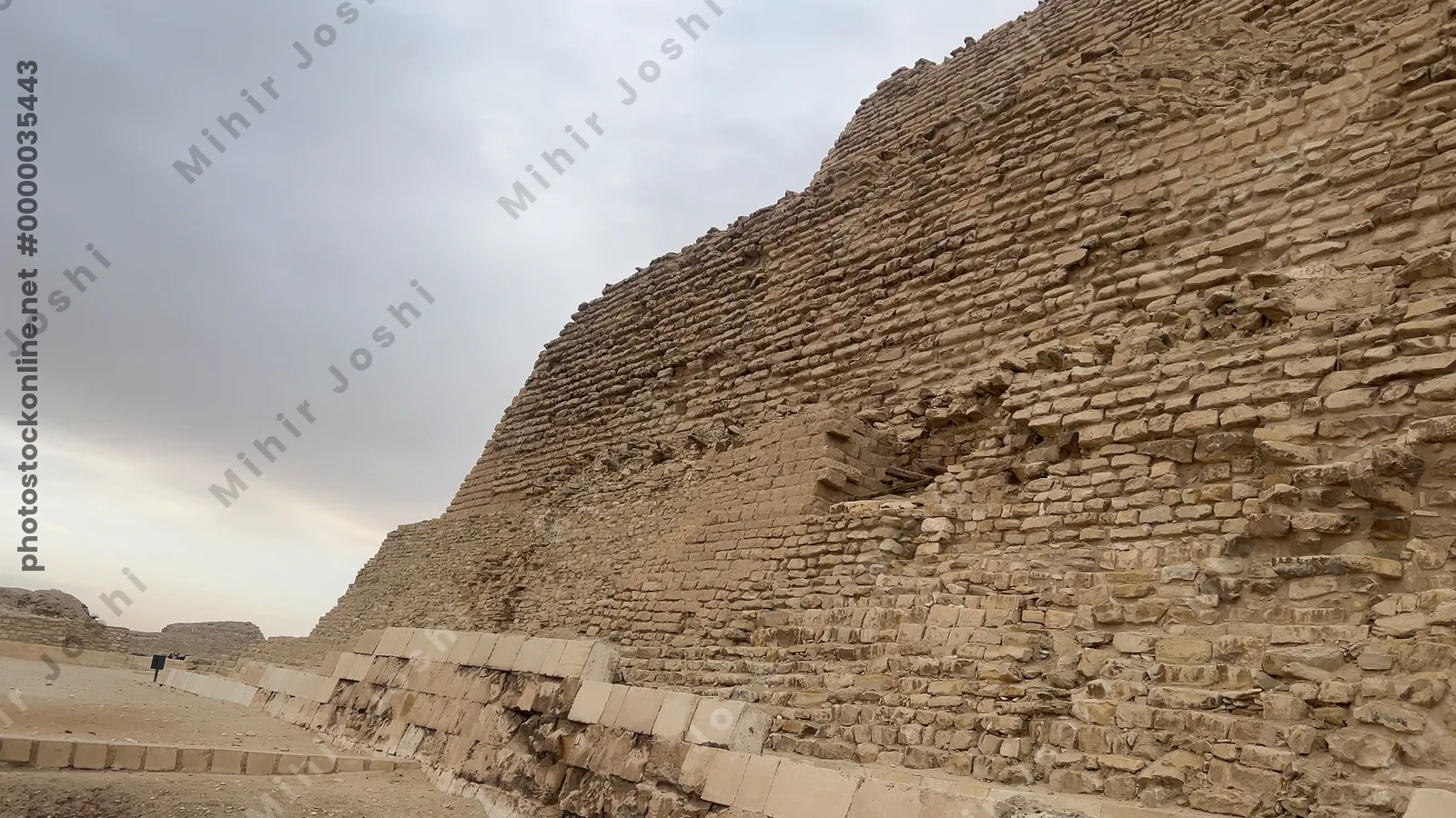 Saqqara, Egypt - Feb 5, 2024: The Step Pyramid of Djoser at Saqqara, Egypt an ancient architectural marvel from Egypt's Old Kingdom period.