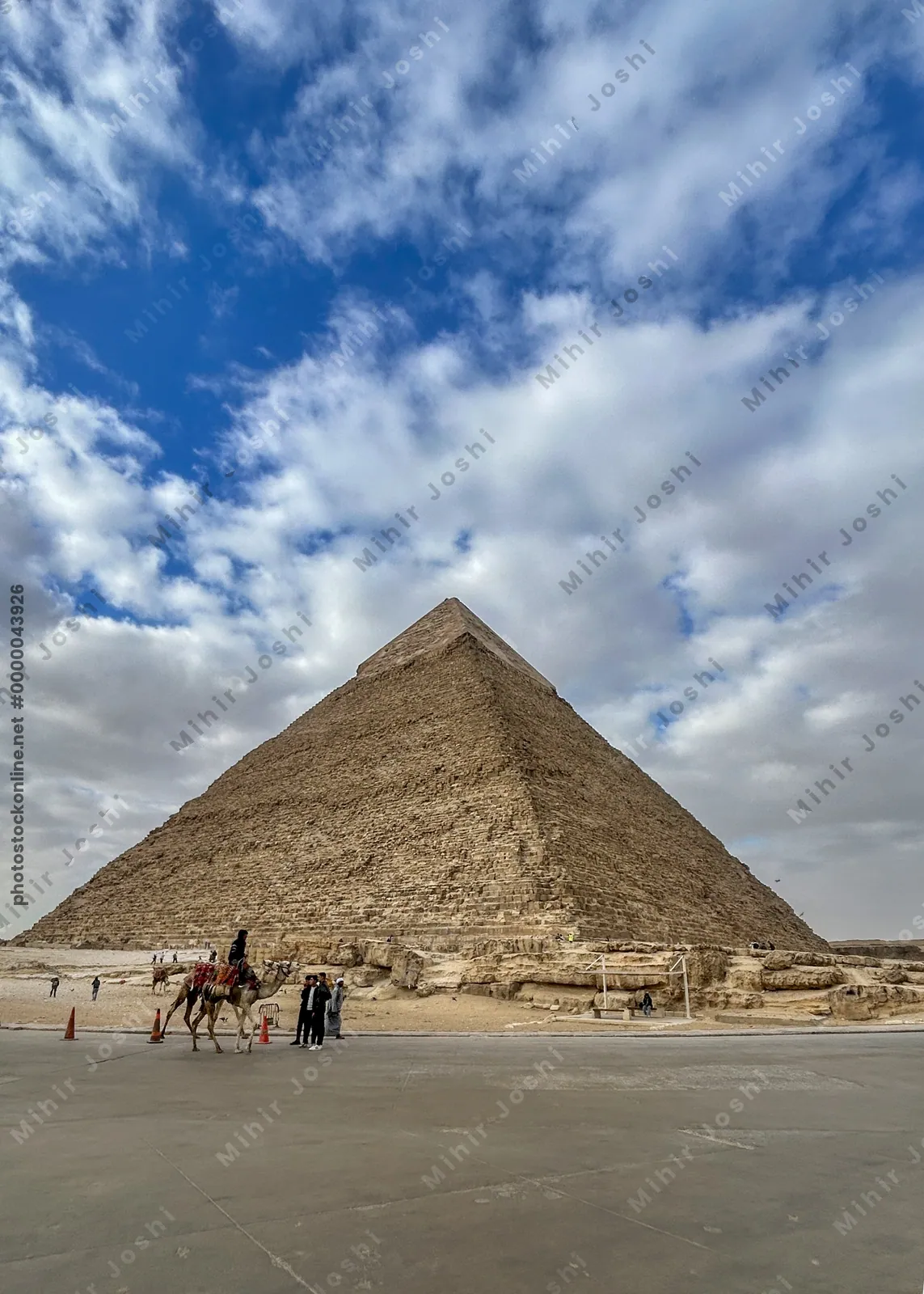 Giza, Egypt - Feb 6, 2025: Pyramid of Khafre, the second tallest pyramid at Giza, with remnants of its original casing, near Cairo, Egypt.