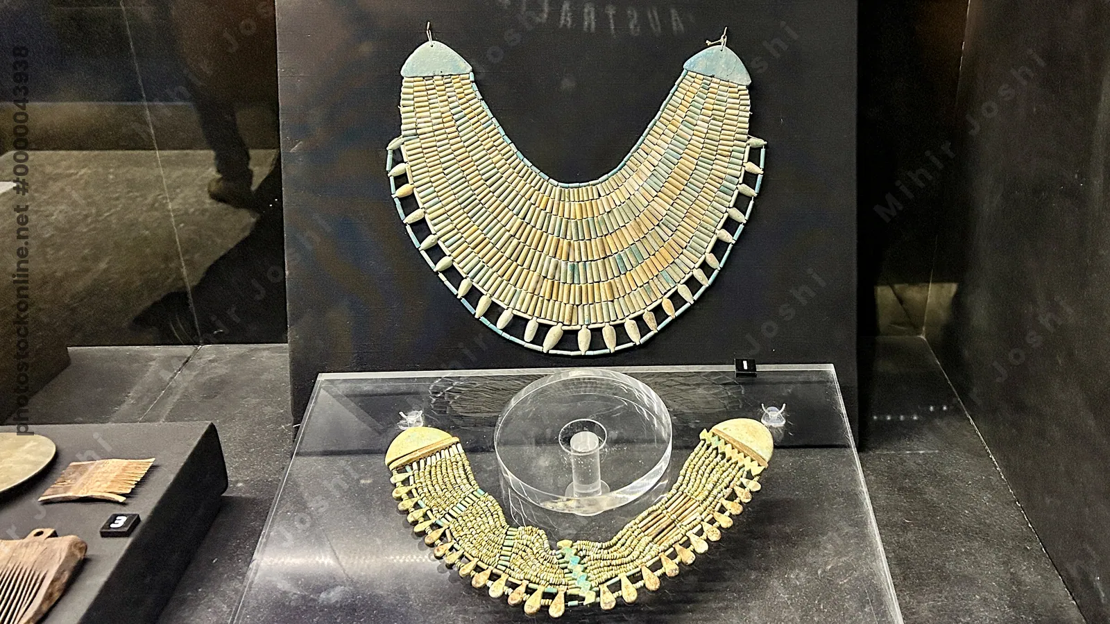 Saqqara, Egypt - Feb 5, 2025: two wide faience collars (usekhs) from Abusir on display at the Imhotep Museum, Saqqara