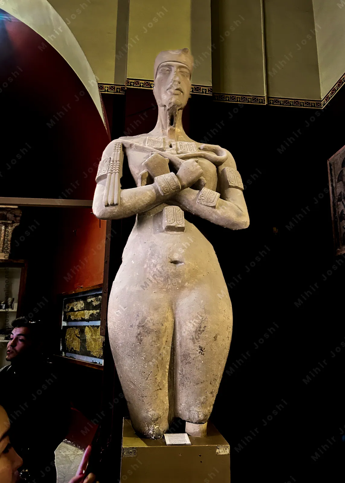 Cairo, Egypt -  Feb 4, 2025: Statue of Akhenaten, the revolutionary pharaoh who introduced Aten worship, at the Egyptian Museum in Cairo.