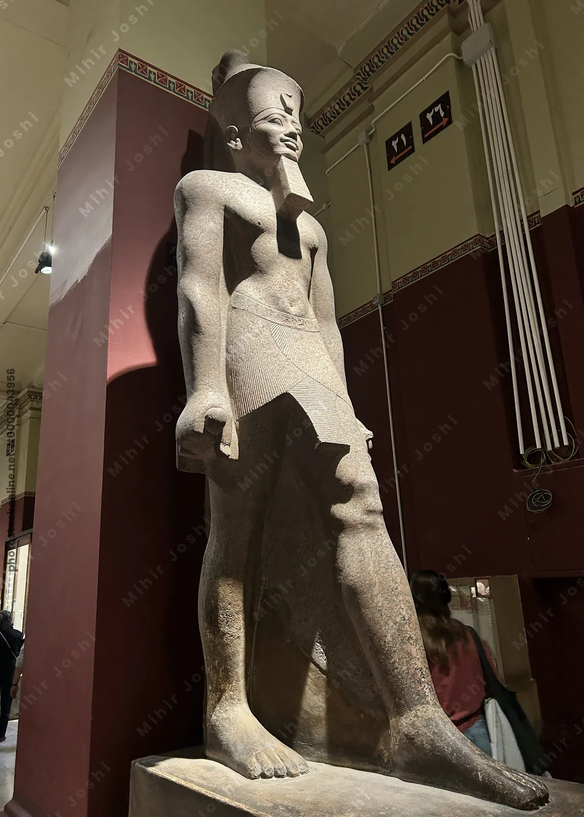 Cairo, Egypt -  Feb 4, 2025: standing statue of Pharaoh Ramesses II, displayed at the Egyptian Museum in Cairo.