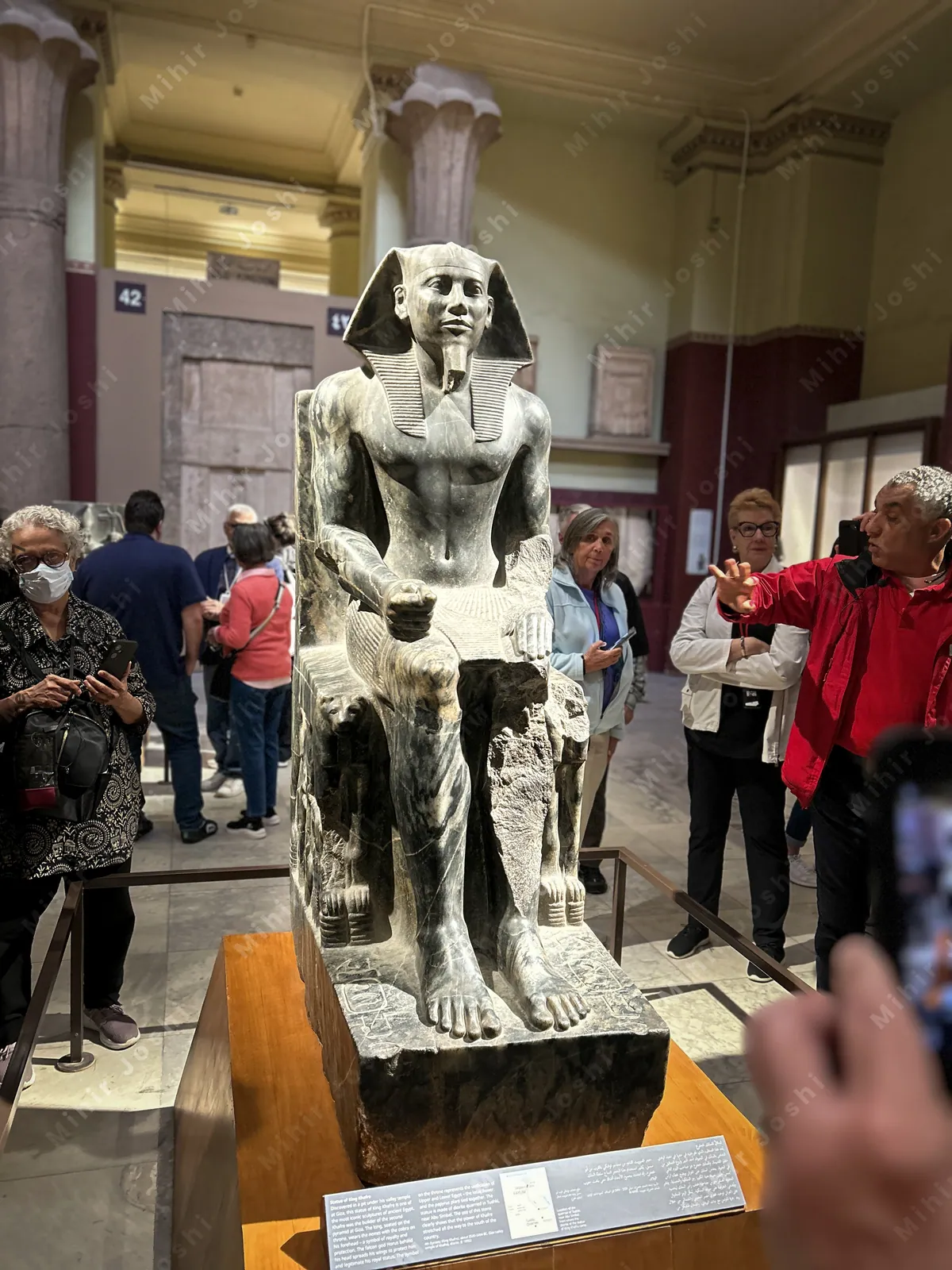 Cairo, Egypt -  Feb 4, 2025: Diorite statue of Pharaoh Khafre (Khefren), builder of Giza's second pyramid, displayed at the Egyptian Museum in Cairo, Egypt.