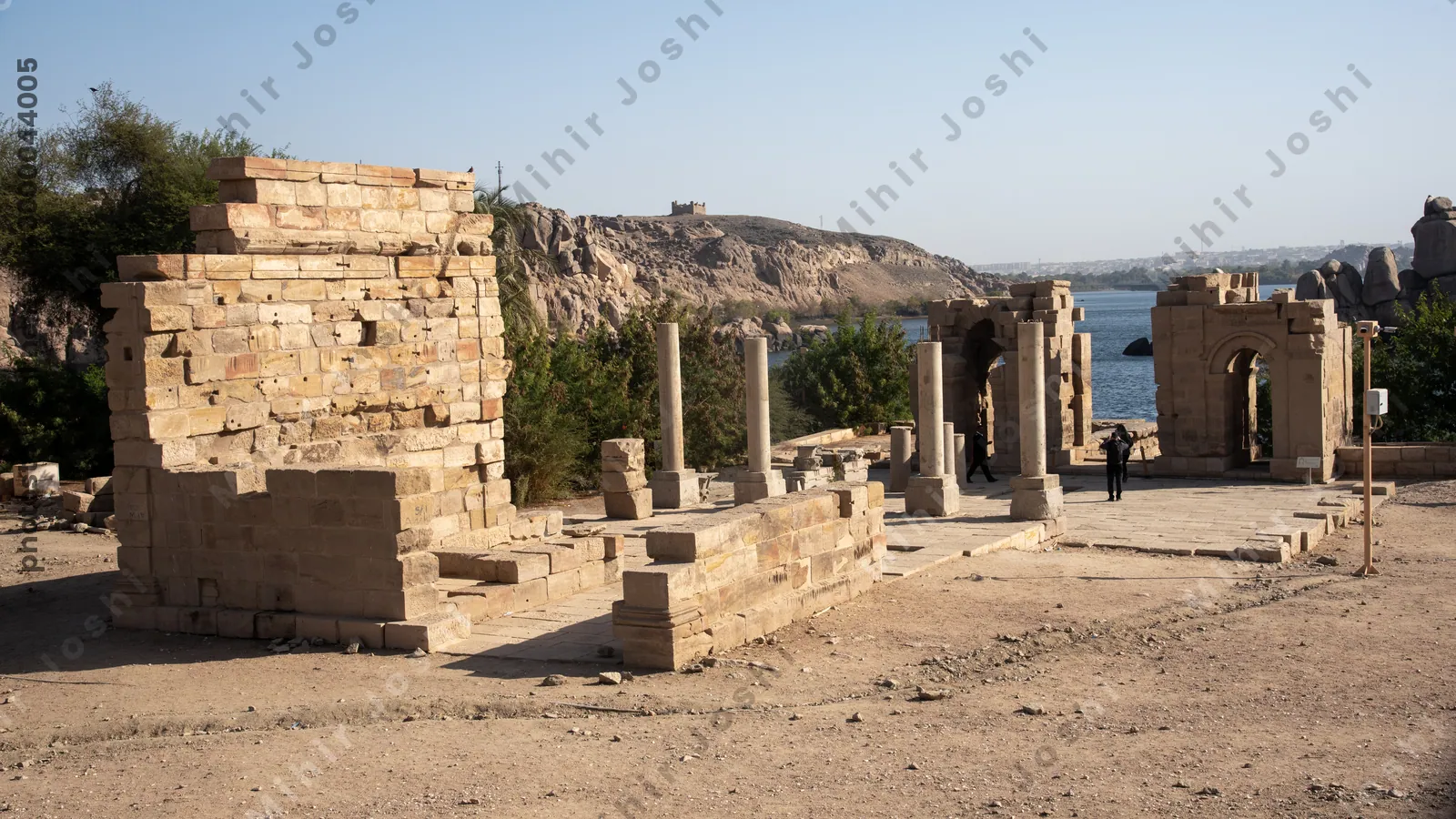 Aswan, Egypt - Feb 7, 2025:  Gate of Diocletian at the Temple of Isis, an ancient Roman addition to the Philae complex, now on Agilkia Island, Aswan, Egypt