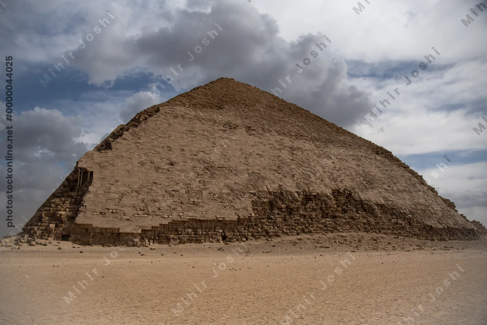 Dahshur, Egypt - Feb 5, 2024: The Bent Pyramid at Dahshur, built by Pharaoh Sneferu during the Old Kingdom, shows a unique change in angle midway up its structure.