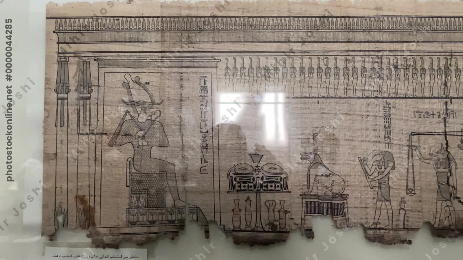 Cairo, Egypt - Feb 4, 2024: Illustrated papyrus from Book of the Dead for Priest of Bastet, Djoser, on display at the Egyptian Museum in Cairo, Egypt.