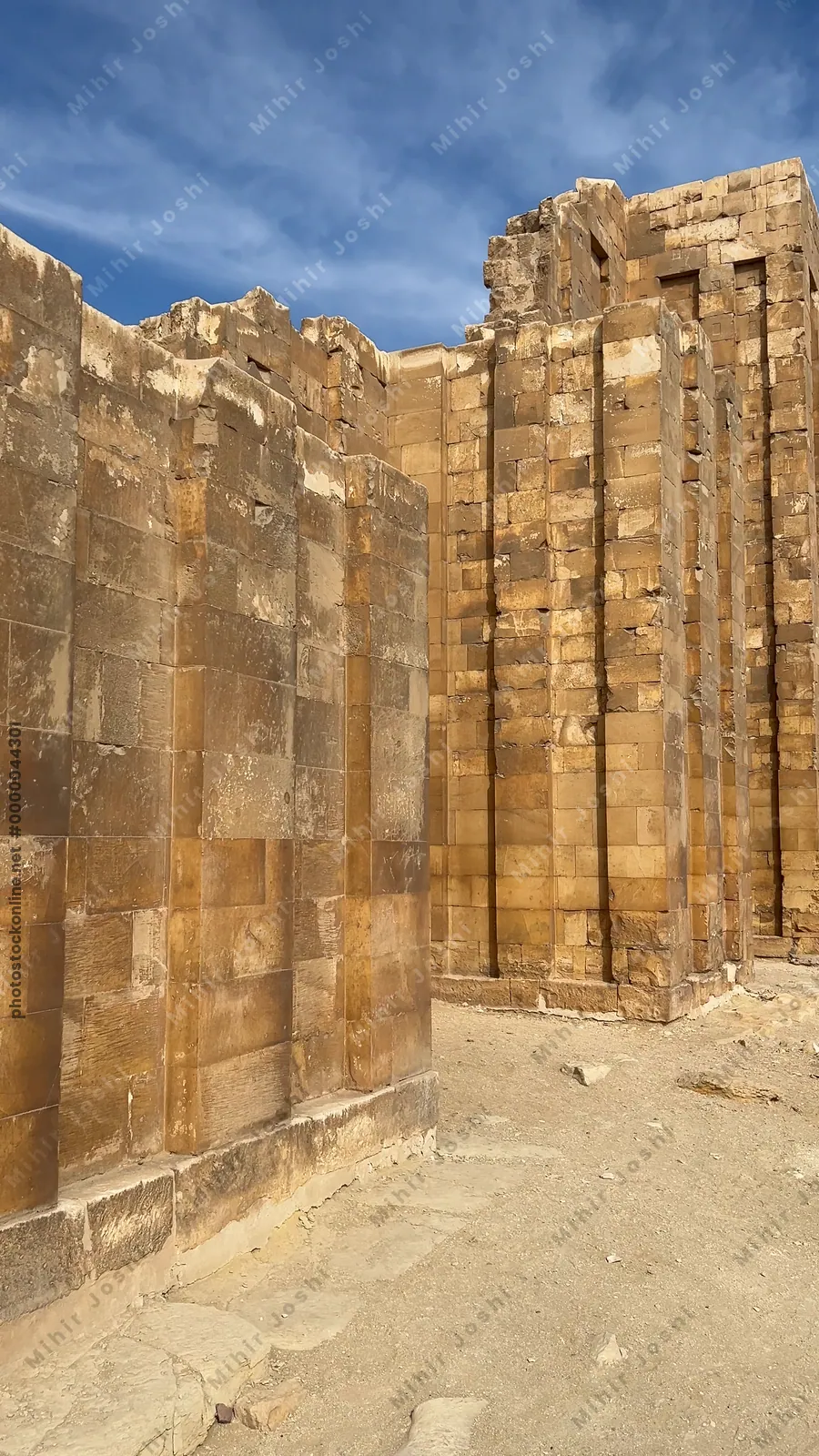 Saqqara, Egypt - Feb 5, 2024: Southeast corner entrance gate of the Step Pyramid complex at Saqqara, Egypt, built during the 3rd Dynasty, Old Kingdom.