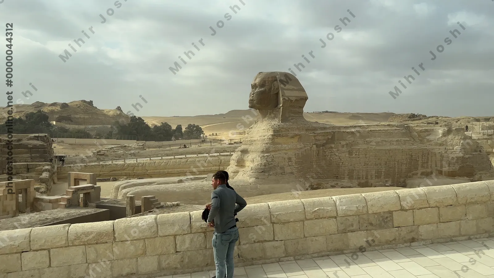 Giza, Egypt - Feb 5, 2025: Passing view of the Great Sphinx of Giza from a bus