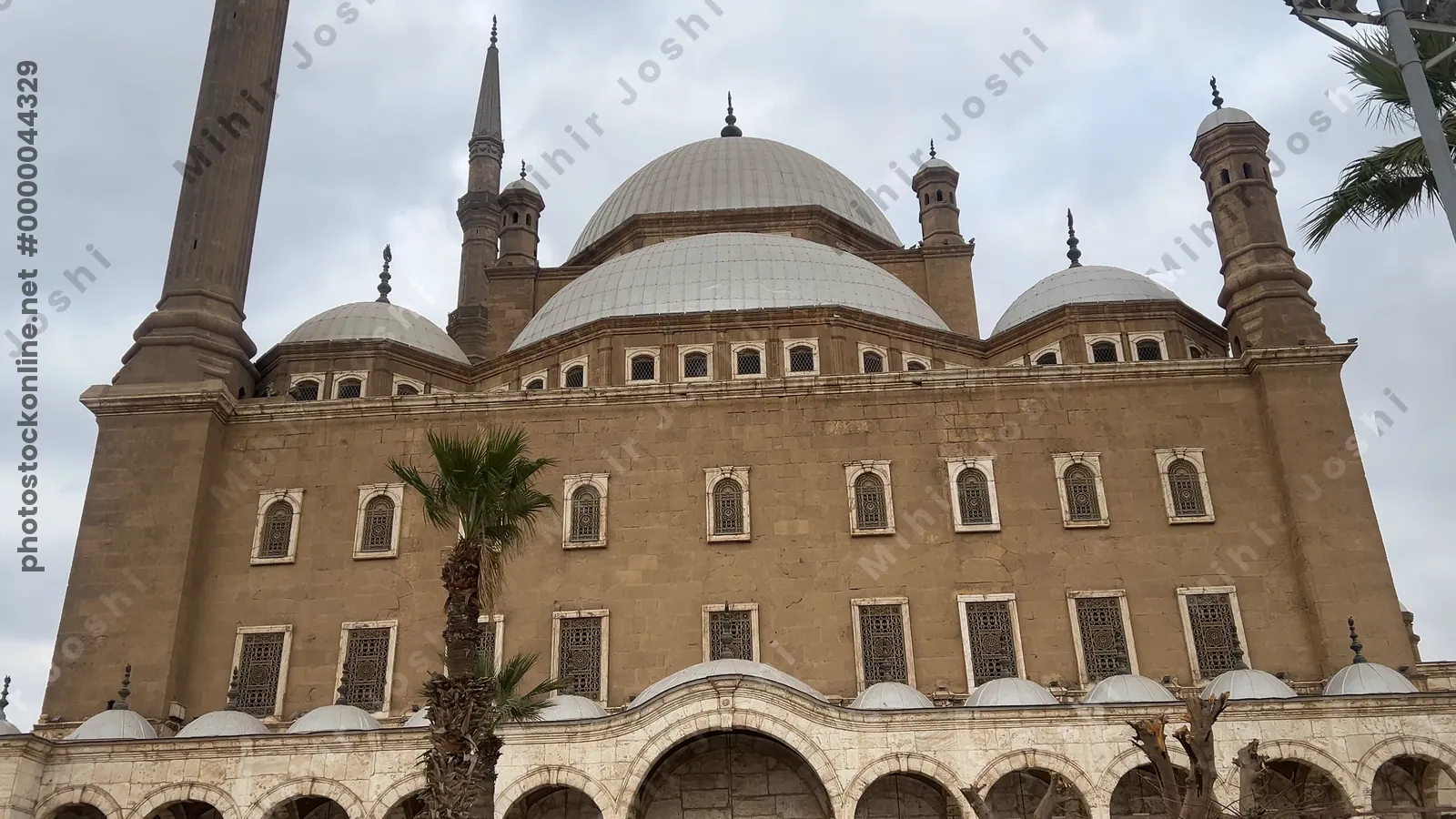 Cairo, Egypt - Feb 6, 2025: Exterior view of the Muhammad Ali Mosque at the Citadel of Cairo, a famous Ottoman-era landmark and top tourist attraction in Egypt.