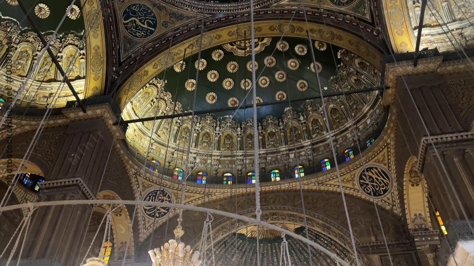 Cairo, Egypt - Feb 6, 2025: Beautifully Lit Interiors and Ornate Domes of Muhammad Ali Mosque with Muezzin’s Call to Prayer – Cairo Citadel