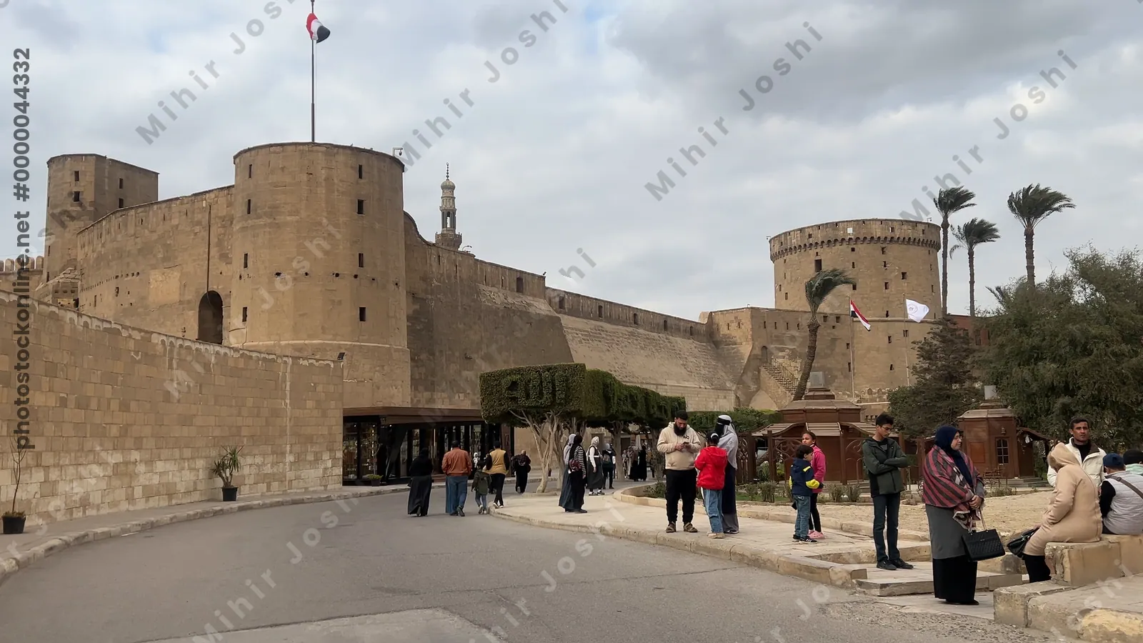 Cairo, Egypt - Feb 6, 2025: Exterior view of the historic stone ramparts of the Citadel of Cairo, an iconic medieval Islamic-era fortification in Egypt.