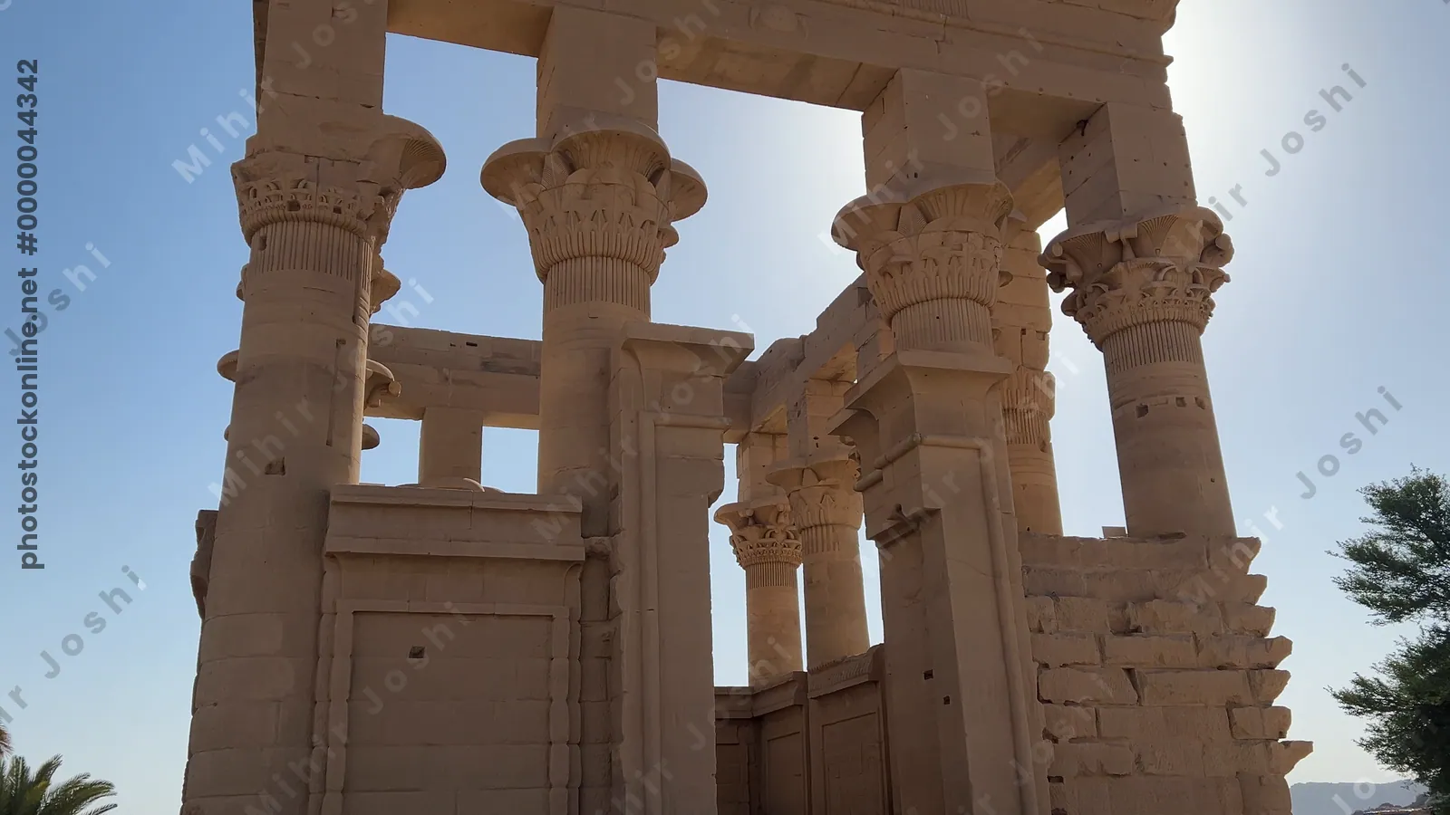 Agilkia, Egypt - Feb 7, 2024: Roofless ancient Egyptian temple, Trajan's Kiosk, also known as Pharaoh's Bed, located on Agilkia Island near Aswan, Egypt.