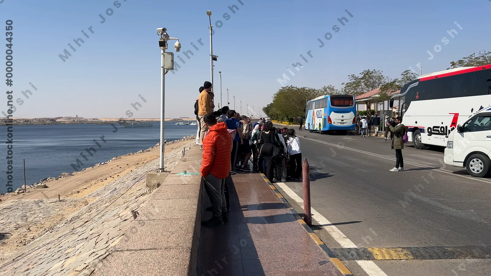 Aswan, Egypt - Feb 7, 2024: Visitors at the Aswan Dam in Egypt, exploring the iconic hydroelectric dam and enjoying views of the Nile River and Lake Nasser.