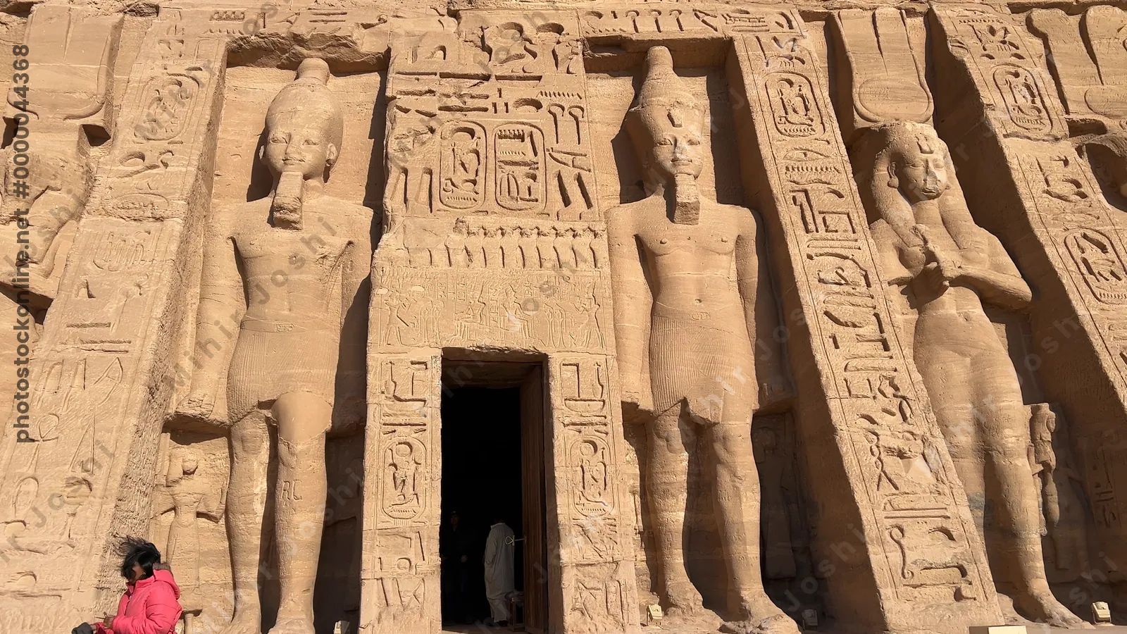 Aswan, Egypt - Feb 8, 2025: Temple of Ramesses II at Abu Simbel, Egypt, with colossal rock statues at the entrance